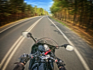 motorcycle driver's view of the empty road