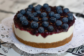 New York cheesecake or classic cheesecake with blueberries. close-up and blur background