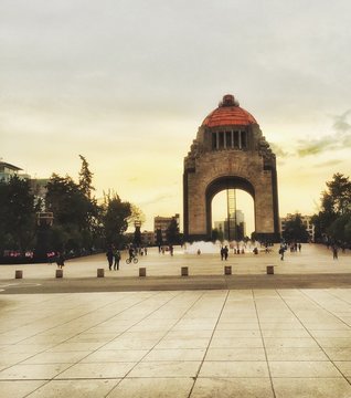 People In Front Of Monumento A La Revolucion During Sunset