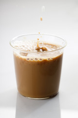 cup of hot coffee on white marble table background.