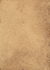 Sand texture top view with copy space. Vertical orientation