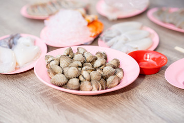 Fresh cockles shell seafood for eating on table