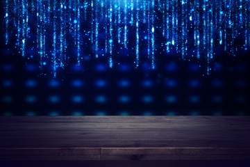 Empty table in front of blue and silver glitter lights background. For product display montage