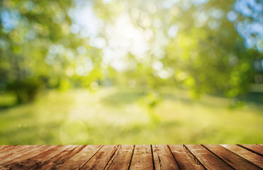 a Wooden table and spring forest background - 352184192