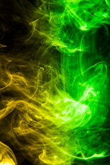 Colored smoke on black background