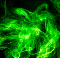Green smoke on black background