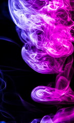 Colored smoke on black background