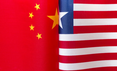 Fototapeta premium fragments of the national flags of China and the Republic of Liberia close up