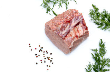 Top view, big piece of raw pork before cooking with dill and pepper.