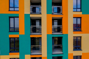 Detail facade with windows. Simple high-rise residential typical building