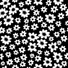 Monochrome seamless pattern. Small white flowers on black background.
