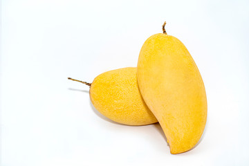 Ripe mango on white background. Close up fresh yellow mangoes isolated on white background,