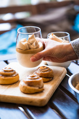 Delicious Daytona coffee with homemade cinnamon rolls on a coffee shop
