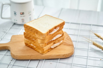 A nice slice of bread with butter in the middle