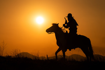 silhouette of cowboy 