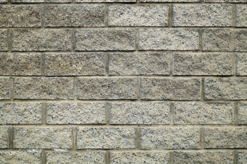 rough concrete wall with imitation of brick