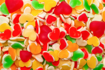 Fototapeta na wymiar Juicy colorful jelly sweets. Gummy candies. Hearts.