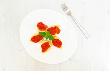 Culurgiones pasta home made with potatoes and mint, a typical traditional pasta from Sardinia
