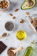 healthy fats sources flax nuts oil avocado chia seeds bitter chocolate . Concept of healthy food