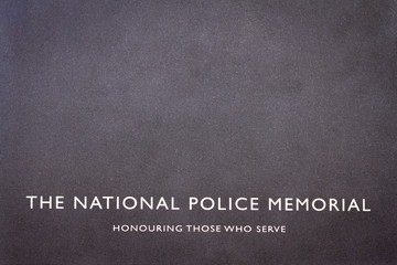 London, UK - May 14 2020: The stone inscription on the National Police Memorial: Honouring Those...
