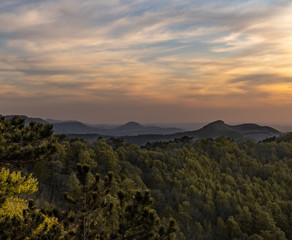 sunset over the forest in the mountains of the Swabian alb