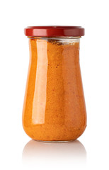 red basil pesto sauce in glass jar