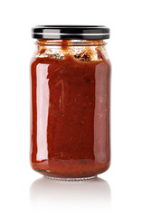 Tomato sauce jar on white background