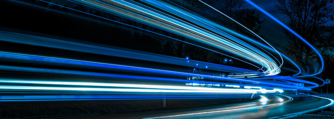 blue car lights at night. long exposure