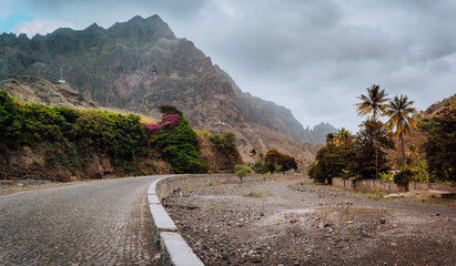 Rural landscape with road surrounded by arid mountains in the Coculi Valley on the island of Santo Antao in Cape Verde