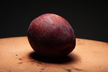 rotten apple and black background