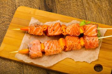 Raw salmon skewer