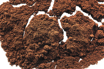 Dark ground coffee bean crushed craked broken isolated on white background