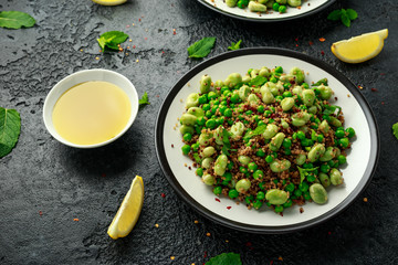 Vegan Green broad beans and quinoa salad with sweet peas and mint. Healthy food.
