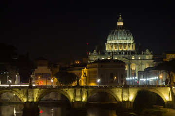 Fototapeta premium Night scene of Rome, Tevere river with basilica in background