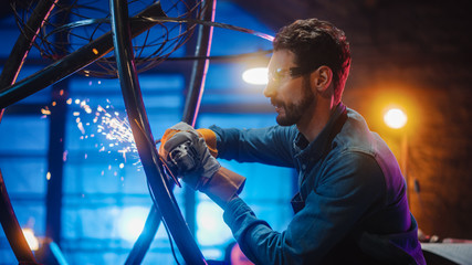 Close Up of a Talented Innovative Artist Using an Angle Grinder to Make an Abstract, Brutal and...