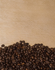 coffee beans on a gold wooden background
