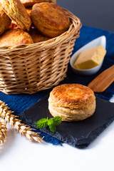 Food concept Homemade browned crust butter milk American biscuits or Scones with copy space