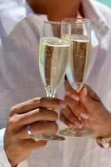 wedding wine glasses of champagne on the table bride and groom holding hands wineglass wedding dress bride love married 