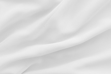 Luxury cloth texture with white fabric of silk for backdrop, wedding background. Seamless pattern of satin cotton.