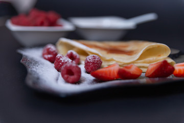 Plate with fruit and pancake