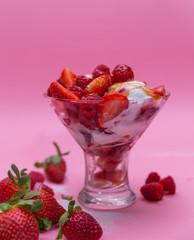 ice cream with strawberries and raspberries