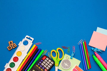 School accessories (pencils, pens, calculator, paper clips, paper, felt-tip pens, paints, scissors). School preparation concept