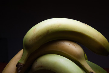 group of bananas and black background