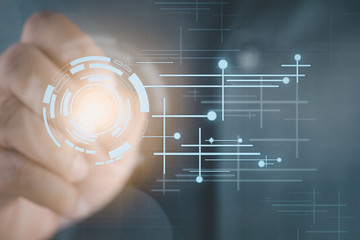 Businessman on background holograms data digital sphere with a pen