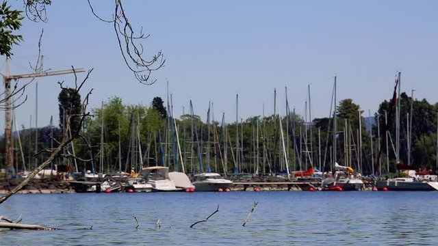 Sail boats in the harbour of Morges in Switzerland