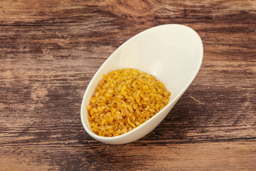 Vegetarian cuisine - dry bulgur for cooking