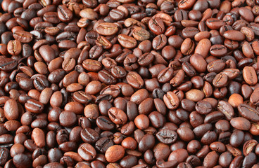 Fragrant, roasted coffee beans, top view, background from coffee beans