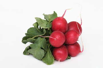 Red radishes isolated on white background