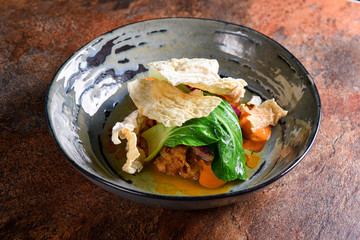 Bowl with vegetable and pork chop