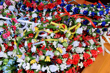 Obraz premium colorful wreaths of artificial flowers